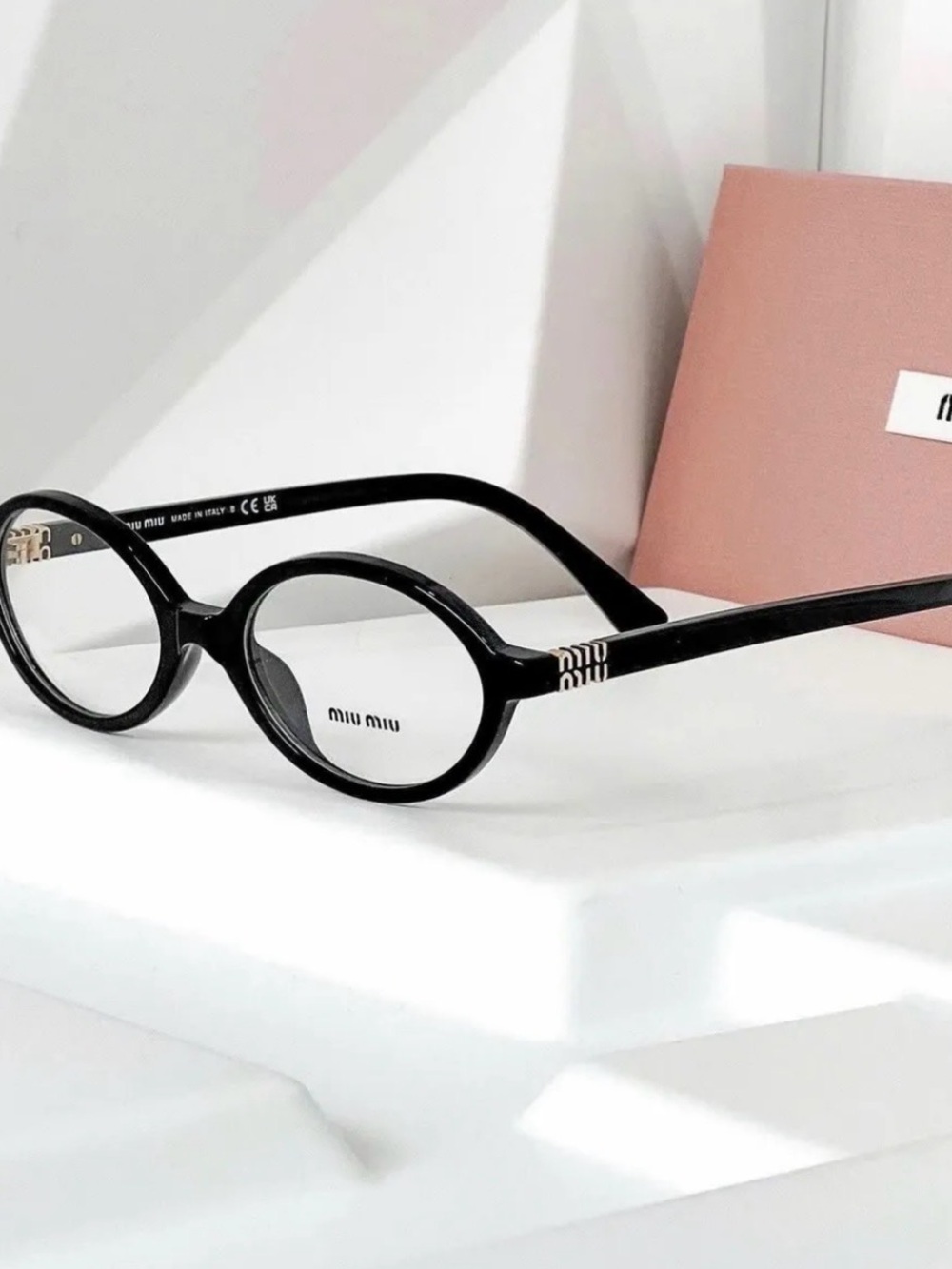 Miu Miu Black Round Optical Glasses with Signature Temple Detail